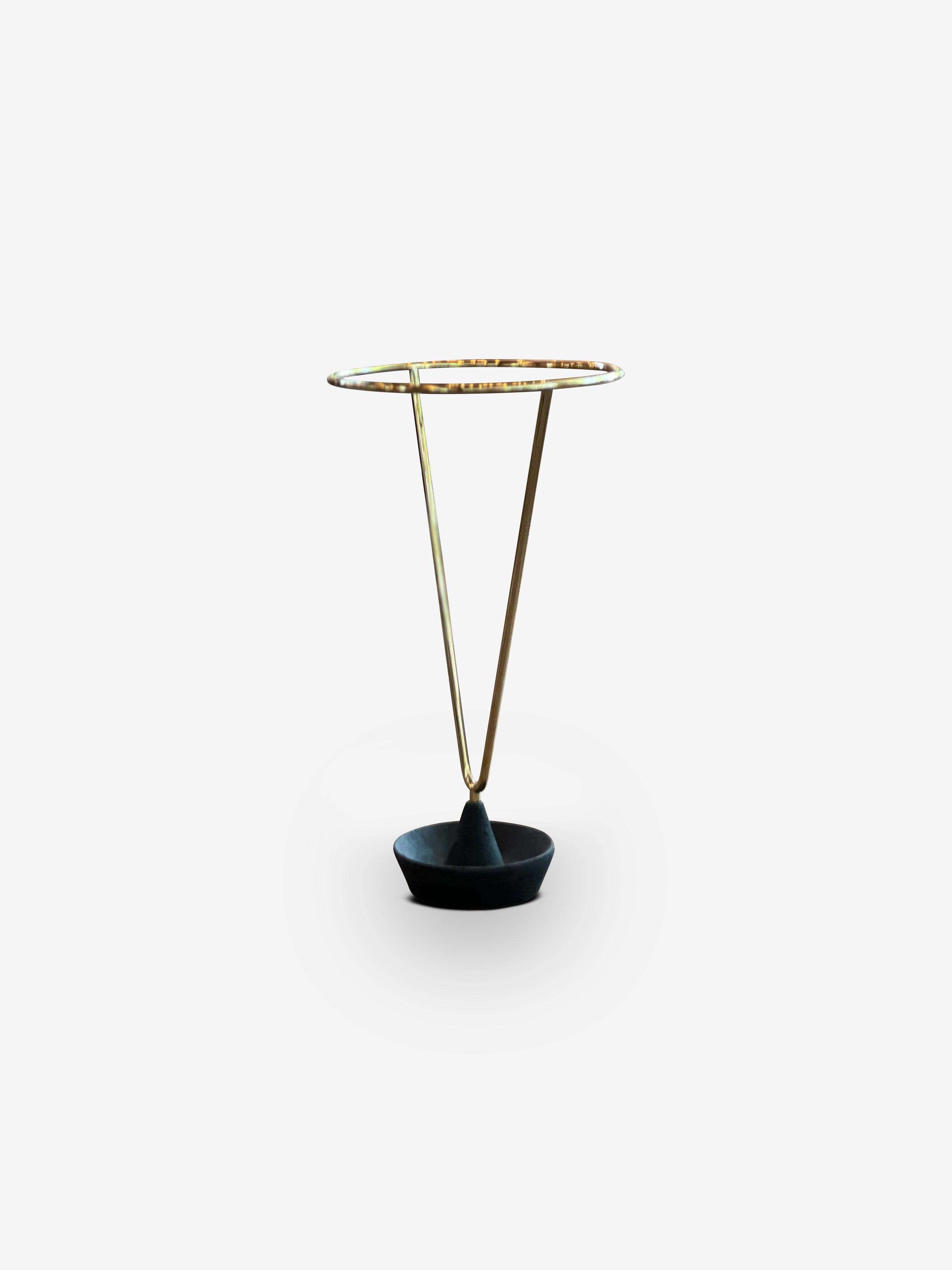 http://www.monc13.com/cdn/shop/files/umbrella-stand-with-polished-brass-and-zinc-lacquered-base-by-carl-aubock-monc-xiii-1.jpg?v=1695748354