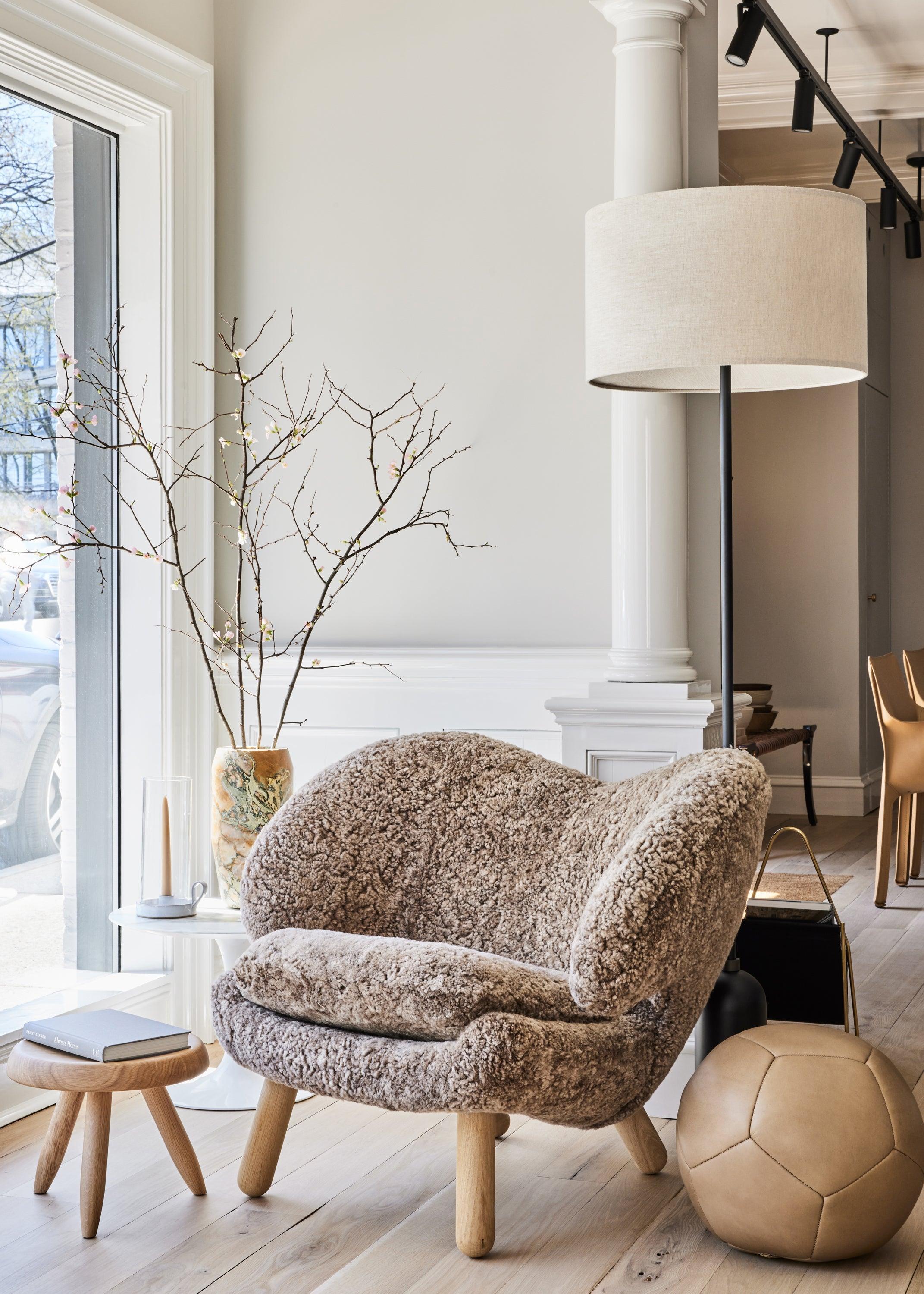 Pair Of Finn Juhl Pelican Chair in Sahara Sheepskin